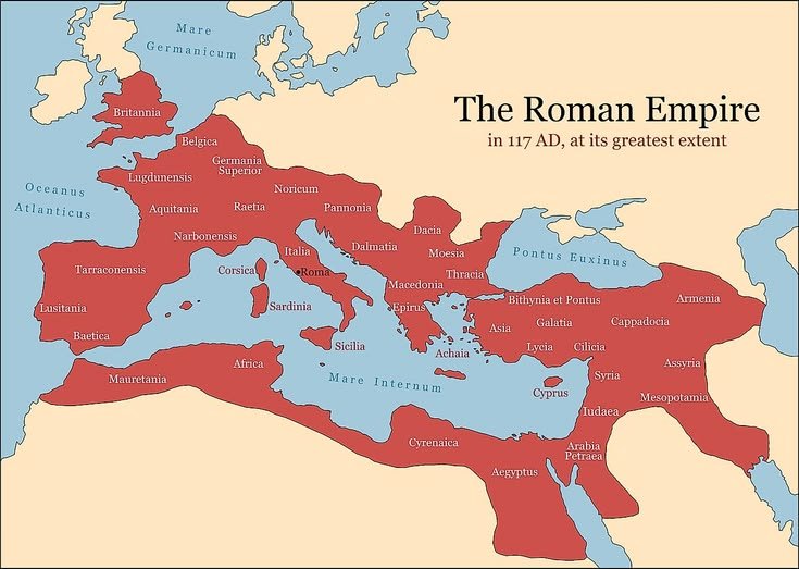 Map showing the Roman Empire highlighted in red at its maximum territorial extent in 117 AD under Emperor Trajan, spanning Europe, North Africa, and the Middle East.