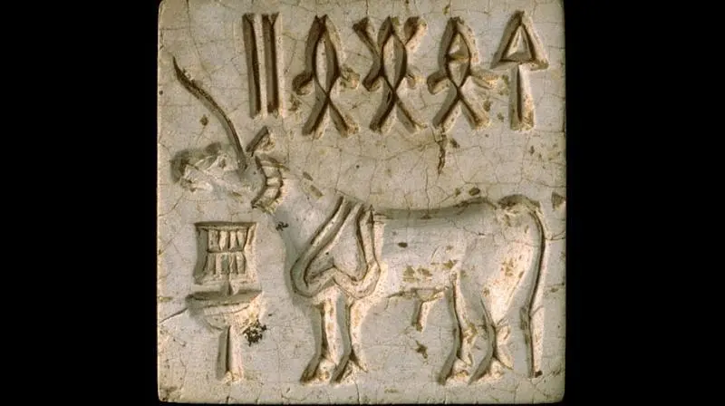 Ancient Harappan seal featuring Indus script and an elephant motif